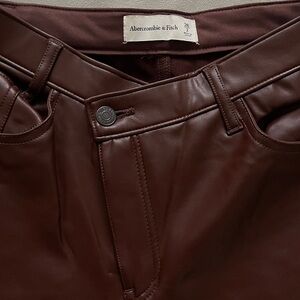 ABERCROMBIE & FITCH asymmetrical faux leather straight fit pants